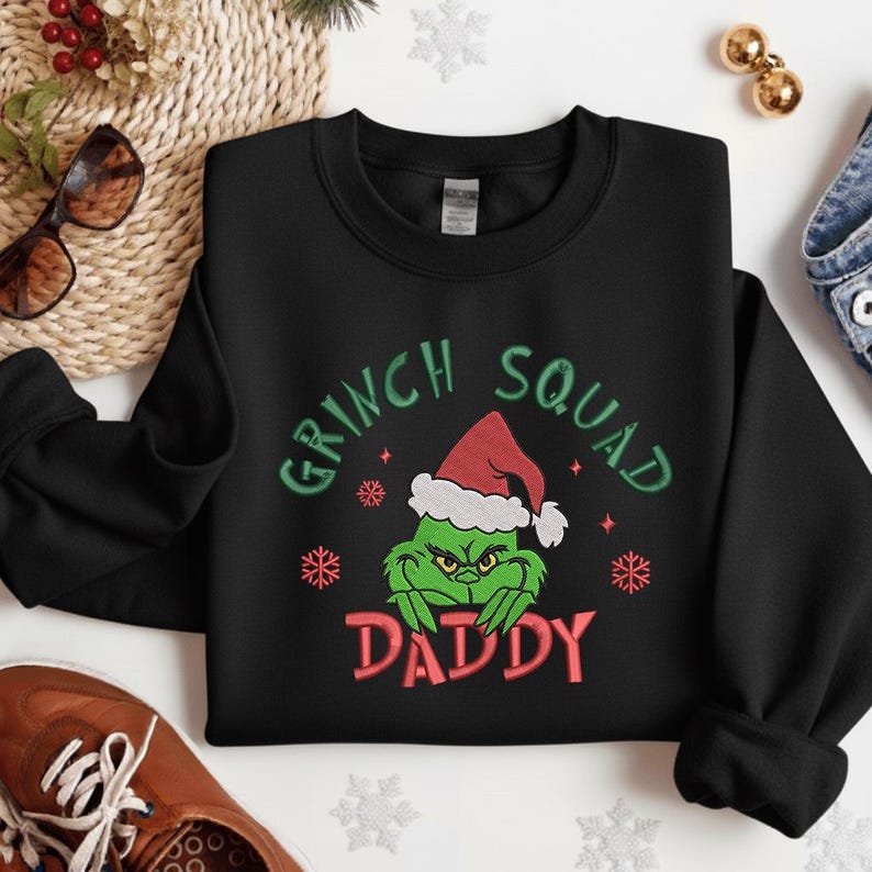 Grinch Squad Daddy Sweatshirt   Funny Christmas Hoodie With Santa Hat Grinch Design Holiday Matching Family Sweater Gift For Dad 1761897105451.jpg