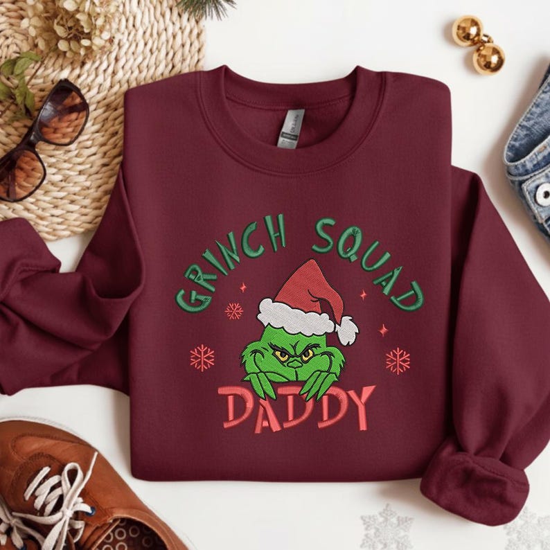 Grinch Squad Daddy Sweatshirt   Funny Christmas Hoodie With Santa Hat Grinch Design Holiday Matching Family Sweater Gift For Dad 1761897105889.jpg