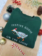 Festive Goose On The Loose Sweatshirt Funny Christmas Goose Shirt Embroidered Holiday Crewneck Ugly Sweater Party Top 1762159546513.jpg