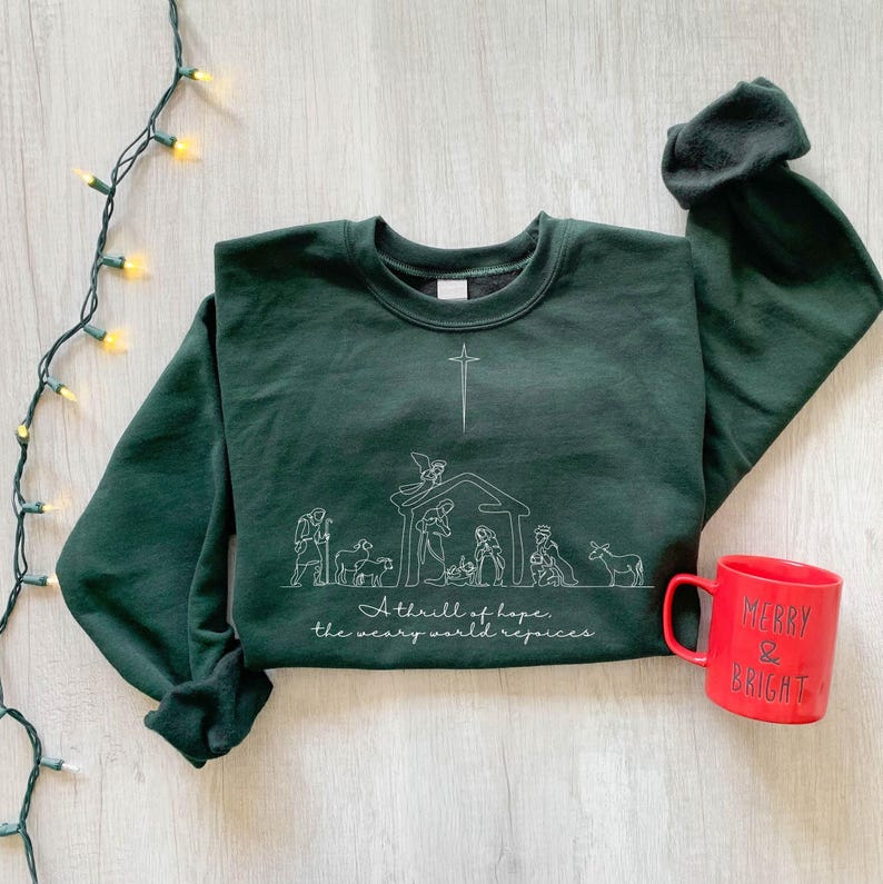 A Thrill Of Hope The Weary World Rejoices Sweatshirt  Christian Christmas Sweater Nativity Scene Jesus Lover Gift 1762311599238.jpg