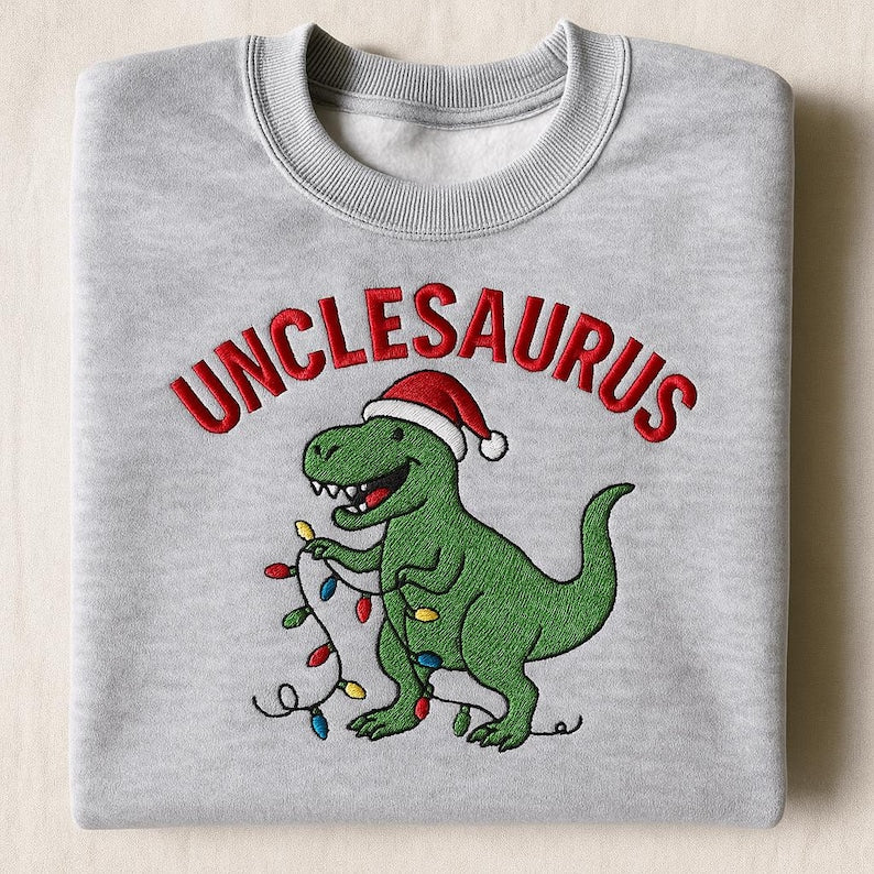 Unclesaurus Christmas Sweatshirt   Funny Dinosaur Uncle Gift T Rex Wearing Santa Hat Holiday Lights Embroidered Hoodie For Men Family Xmas 1762316464171.jpg