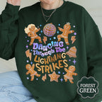 Christmas Gingerbread Dancing Through The Lightning Strikes Sweatshirt Self Love Shirt Merry Shirt New Album 1763348427476.jpg