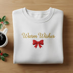 Embroidered Warm Wishes Sweatshirt Gold Script Slogan With Red Ribbon Bow Design White Cozy Winter Gift 1763352428689.jpg
