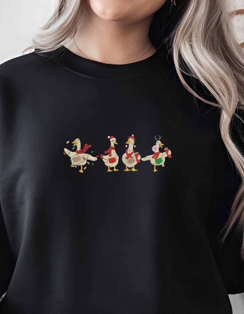 Christmas Geese Embroidered Sweatshirt Funny Christmas Hoodie Sweatshirt Silly Goose Wearing Cross Body Bags And Carrying Tumblers 1763364678136.jpg