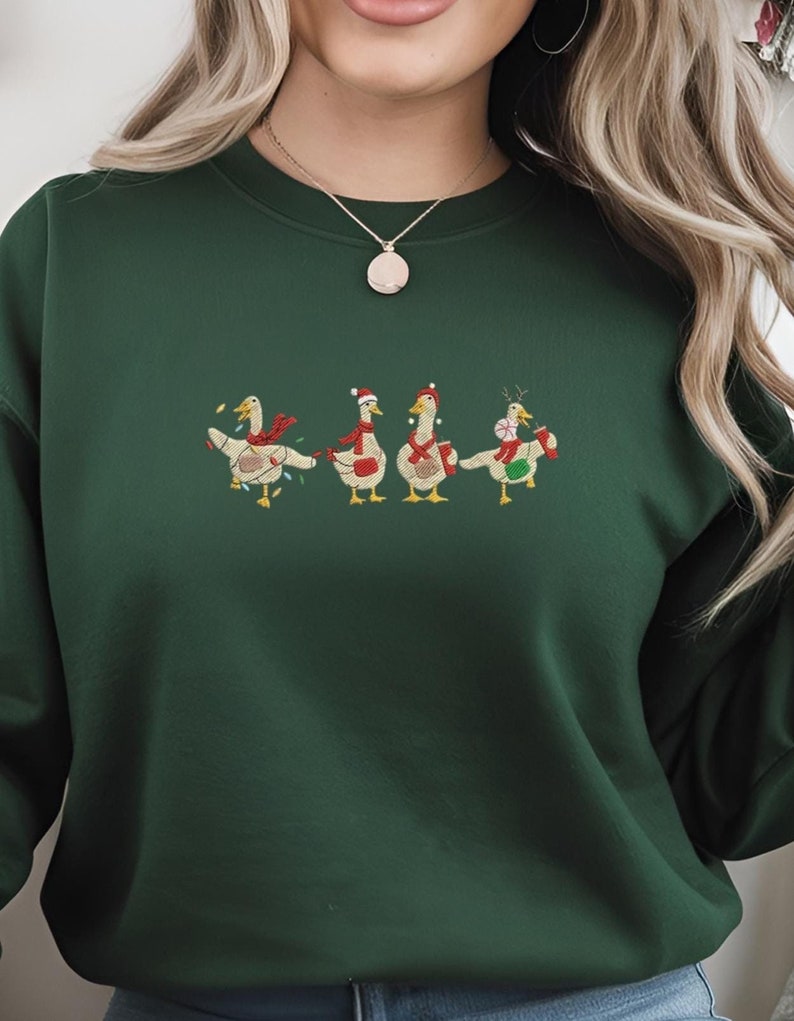 Christmas Geese Embroidered Sweatshirt Funny Christmas Hoodie Sweatshirt Silly Goose Wearing Cross Body Bags And Carrying Tumblers 1763364678251.jpg