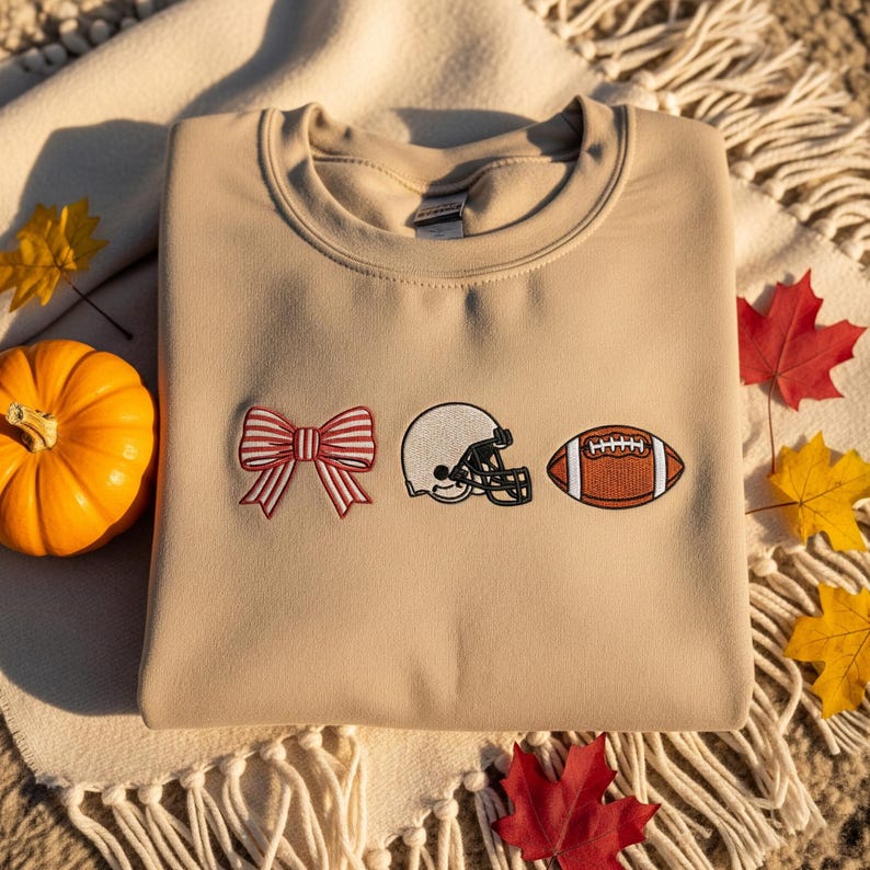 Embroidered Football Icons Sweatshirt Cozy Season Hoodie Football Mom Sweater Cozy Fall Sweatshirt Gift For Her Team Spirit Hoodie 1763371419721.jpg