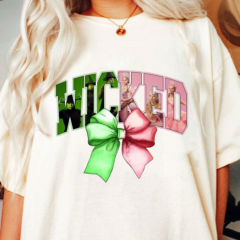 Wicked Coquette Bow Shirt Wicked Inspired Sweatshirt Musical Bow Sweatshirt Green Pink Bow Shirt Changed For Good Shirt Princess Trip Shirt 1763448859849.png