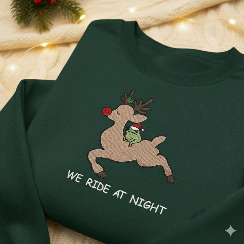 We Ride At Night Sweatshirt Funny Frog Riding Reindeer Embroidery Hoodie Christmas Cozy Embroidered Sweater Chaotic Animal Holiday Hoodie 1763452446610.jpg
