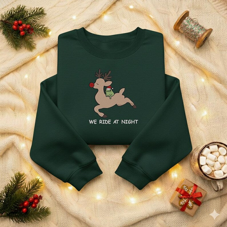 We Ride At Night Sweatshirt Funny Frog Riding Reindeer Embroidery Hoodie Christmas Cozy Embroidered Sweater Chaotic Animal Holiday Hoodie 1763452447201.jpg
