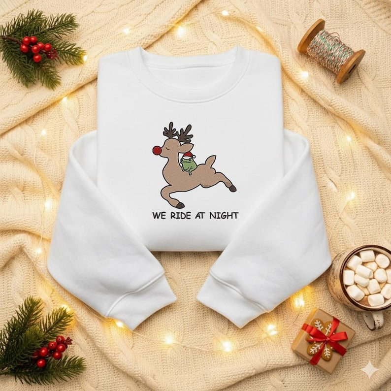 We Ride At Night Sweatshirt Funny Frog Riding Reindeer Embroidery Hoodie Christmas Cozy Embroidered Sweater Chaotic Animal Holiday Hoodie 1763452447243.jpg