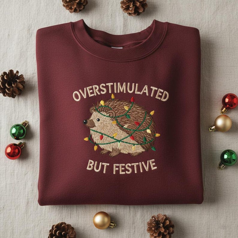 Overstimulated But Festive Embroidered Sweatshirt Cute Hedgehog Christmas Crewneck Sensory Overload Holiday Hoodie Xmas Anxiety Gift 1763538606321.jpg