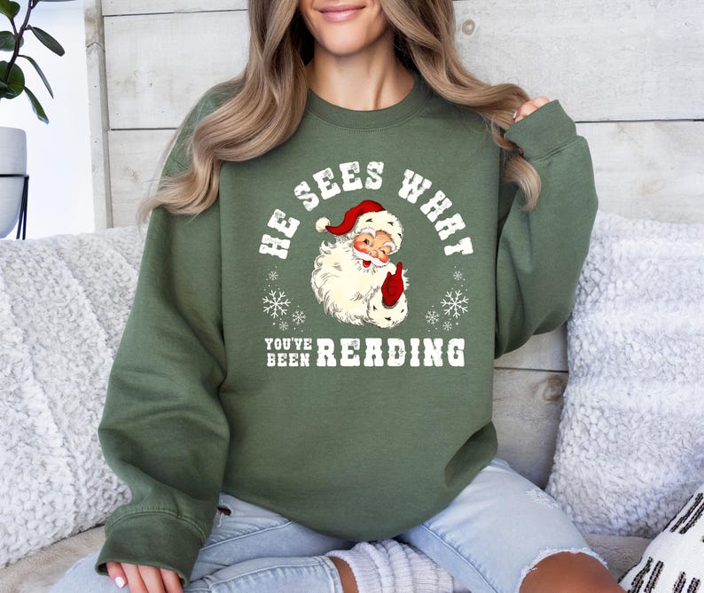 He Sees What Youve Been Reading Santa Sweatshirt Funny Bookish Christmas Santa Sweater Book Lover Gift Xmas Sweatshirt Gift For Her 1763606759462.jpg