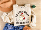 He Sees What Youve Been Reading Santa Sweatshirt Funny Bookish Christmas Santa Sweater Book Lover Gift Xmas Sweatshirt Gift For Her 1763606759486.jpg