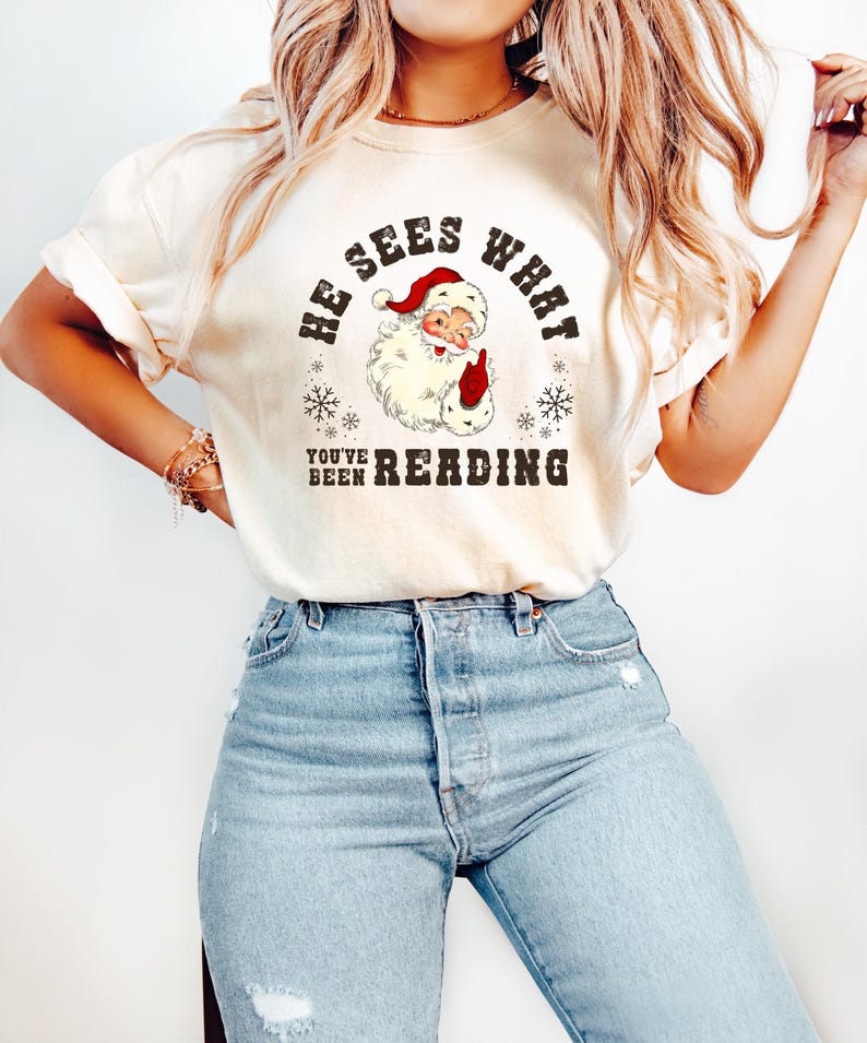 He Sees What Youve Been Reading Santa Sweatshirt Funny Bookish Christmas Santa Sweater Book Lover Gift Xmas Sweatshirt Gift For Her 1763606760046.jpg