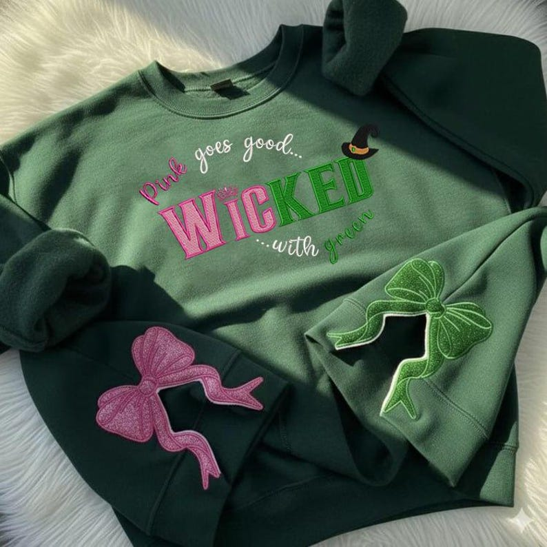 Wicked Glitter Side Bow Embroidered Sweatshirt Wicked Movie Shirt Pink And Green Musical Wizard Of Oz Movie Fans Gift 1763613516136.png