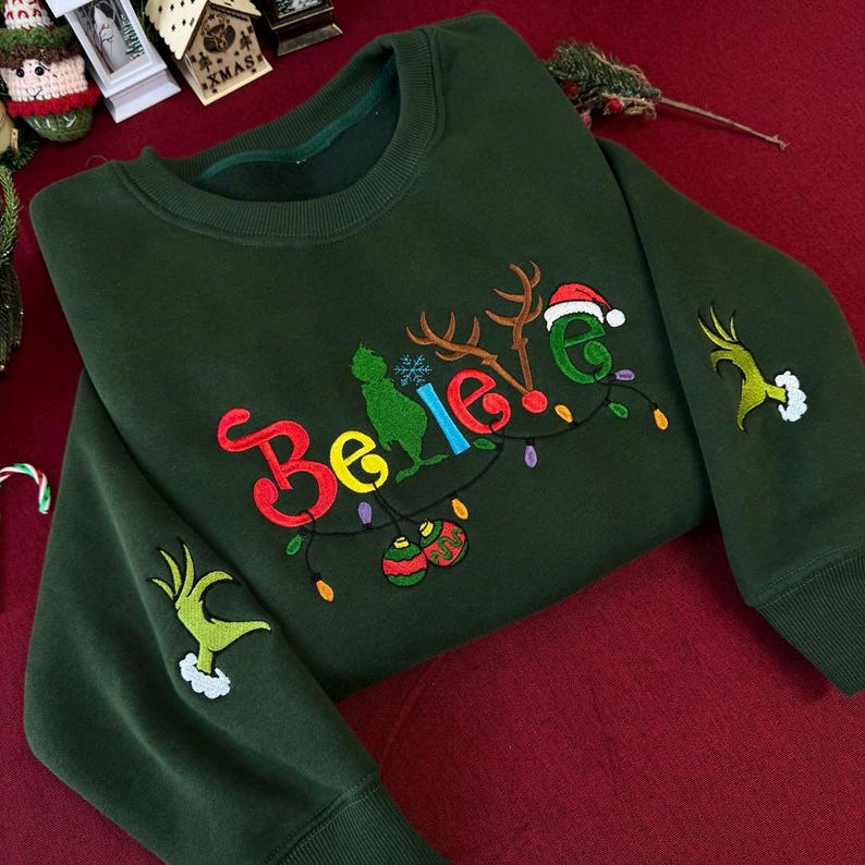 Believe Christmas Embroidered Sweatshirt Cute Green Style Holiday Sweater Christmas Lights Sleeve Shirt Grinchy Sweatshirt Gift For Him 1763780496906.jpg