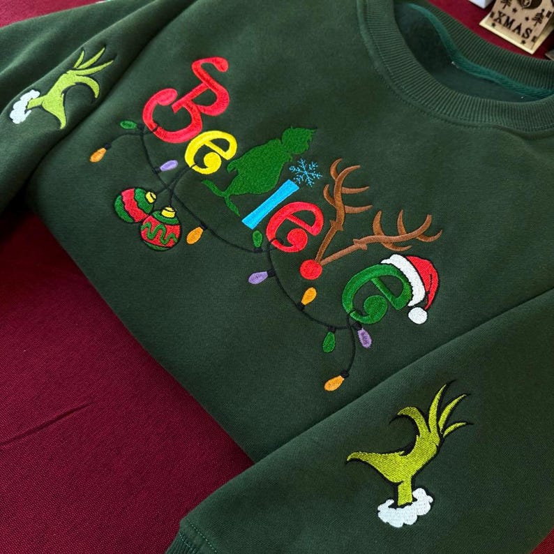 Believe Christmas Embroidered Sweatshirt Cute Green Style Holiday Sweater Christmas Lights Sleeve Shirt Grinchy Sweatshirt Gift For Him 1763780497533.jpg