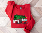 Christmas Sweatshirt Christmas Tree On Fire Truck Sweatshirt Winter Sweater Firefighter Christmas Crewneck Gift For For Firefighter Hero 1764139936163.jpg