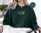 Dragon And Daisies Sweatshirt Cozy Embroidered Book Lover Gift Gildan 18000 1764835588127.png