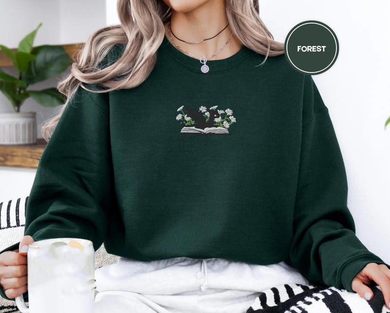 Dragon And Daisies Sweatshirt Cozy Embroidered Book Lover Gift Gildan 18000 1764835588127.png