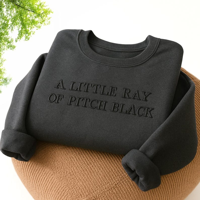 A Little Ray Of Pitch Black Sweatshirt Personalized Embroidered Halloween Crewneck Funny Gift For Best Friend Birthdays Friend Gift 1764838544938.png