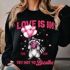 Love Is In The Air Try Not To Breathe Shirt Funny Raccoon Valentine Shirt Sarcastic Anti Love Shirt Shirt Feral Raccoon Humor Shirt 1767674078903.png