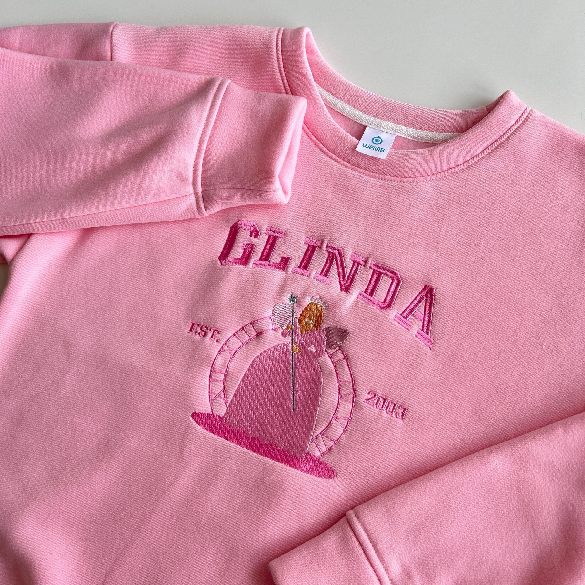 Wicked Side Bow Embroidered Sweatshirt, Wicked Musical Movie Fan Gift, Defy Gravity Crewneck, Christmas Ribbon Side Bow Gift For Her 2_b174bfc4-d546-4ce8-89ee-3c525314a73b.jpg