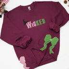 Embroidered Wickeds Sweatshirt, Gift For Fan Of Wizard, Side Bow Sweatshirt 2_f638bed7-b714-4c81-9f2a-2d4428fca76d.jpg