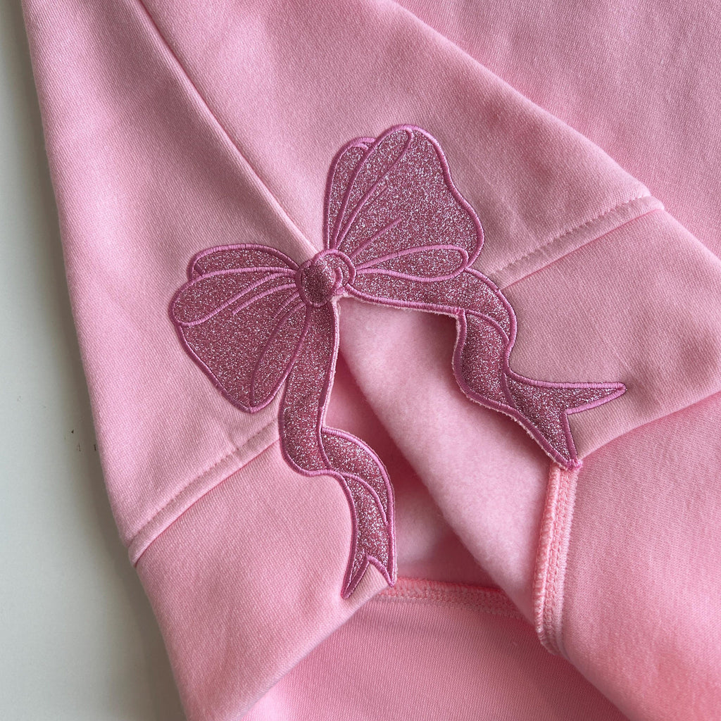 Wicked Side Bow Embroidered Sweatshirt, Wicked Musical Movie Fan Gift, Defy Gravity Crewneck, Christmas Ribbon Side Bow Gift For Her 3_f9857d46-1f47-46b9-bfed-2576366a5453.jpg