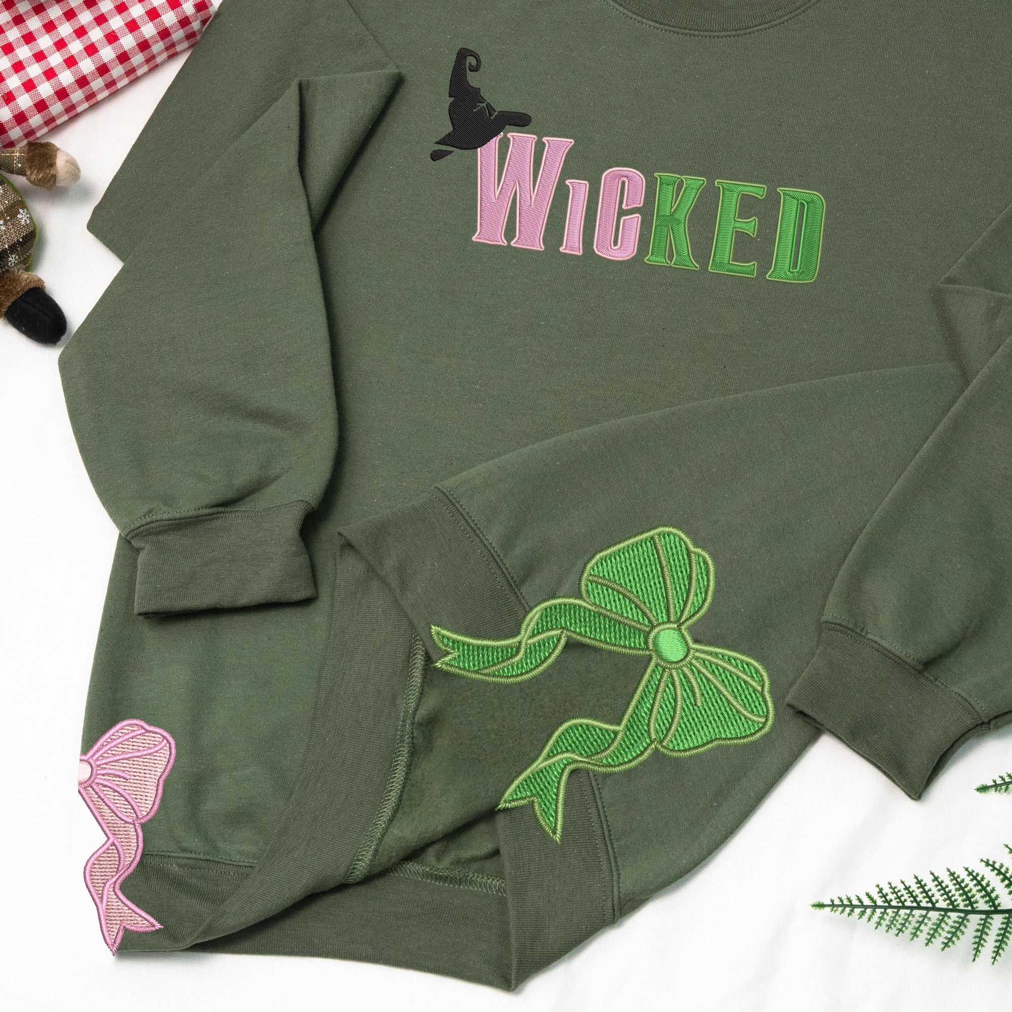 Embroidered Wickeds Sweatshirt, Gift For Fan Of Wizard, Side Bow Sweatshirt 4_214b6d9f-bd39-4856-b4af-b29ca75f97be.jpg