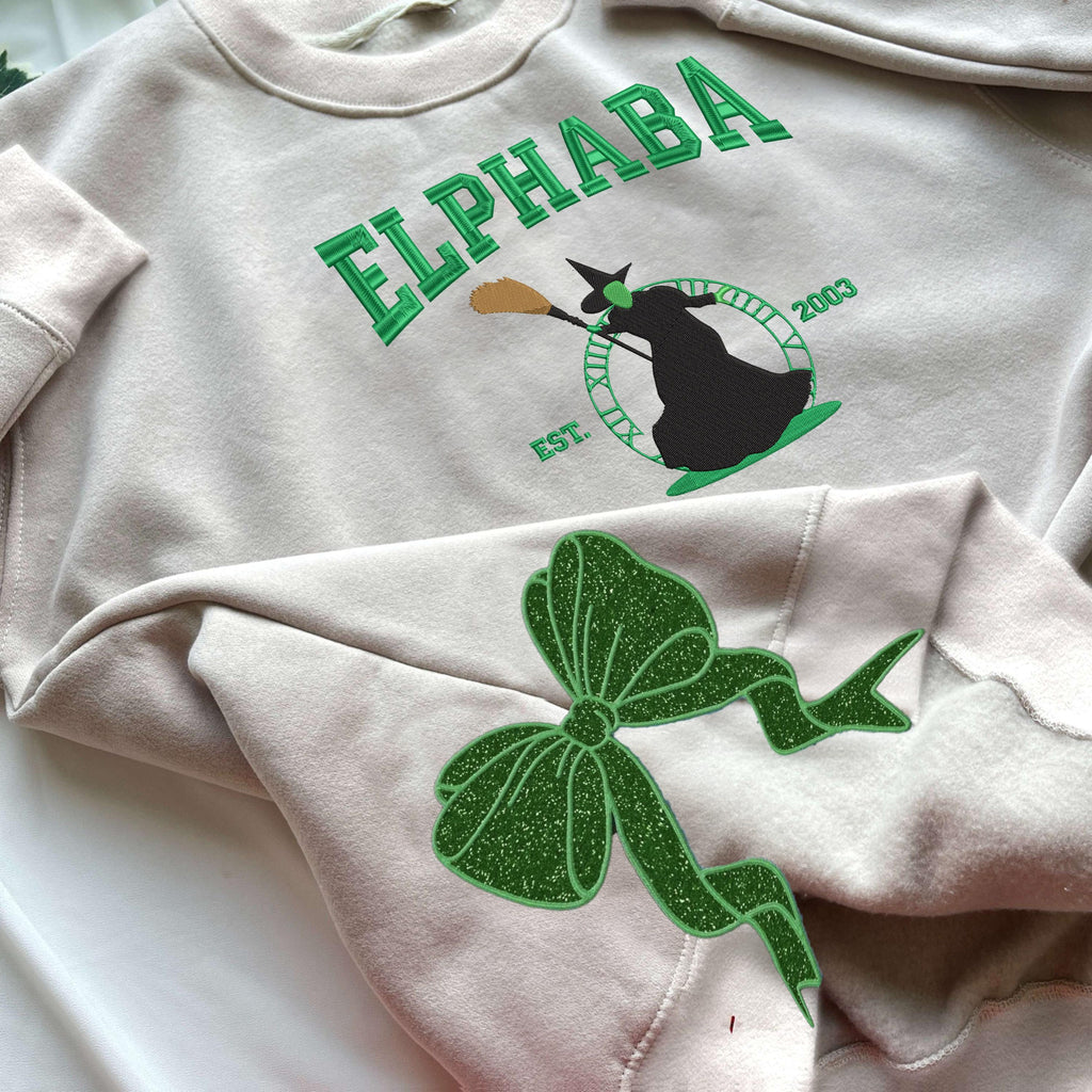 Wicked Side Bow Embroidered Sweatshirt, Wicked Musical Movie Fan Gift, Defy Gravity Crewneck, Christmas Ribbon Side Bow Gift For Her 4_5ecdc91d-287b-4382-bc91-a403fc57d8df.jpg