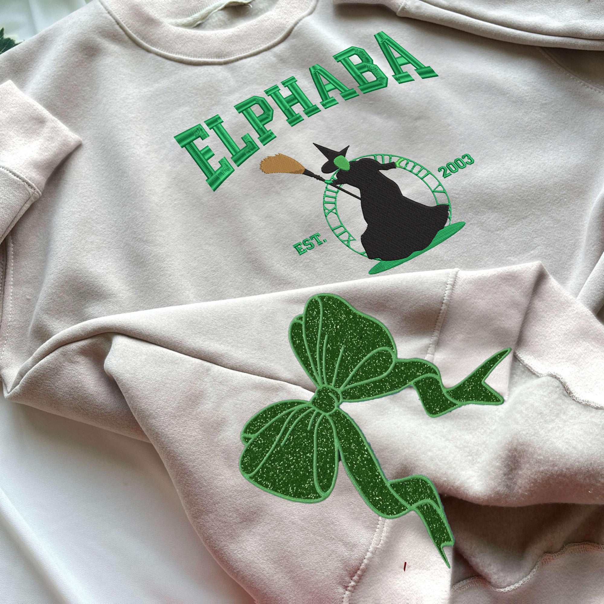 Wicked Side Bow Embroidered Sweatshirt, Wicked Musical Movie Fan Gift, Defy Gravity Crewneck, Christmas Ribbon Side Bow Gift For Her 4_5ecdc91d-287b-4382-bc91-a403fc57d8df.jpg