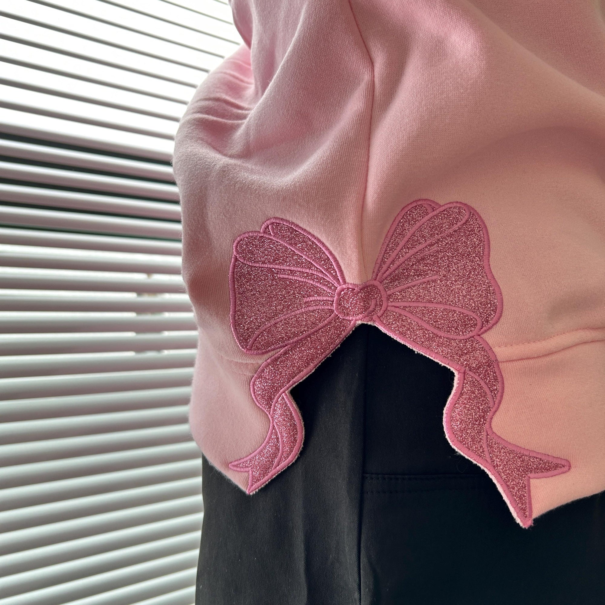 Wicked Side Bow Embroidered Sweatshirt, Wicked Musical Movie Fan Gift, Defy Gravity Crewneck, Christmas Ribbon Side Bow Gift For Her 8_00abce70-4a80-4deb-b8d2-47135c7994f6.jpg