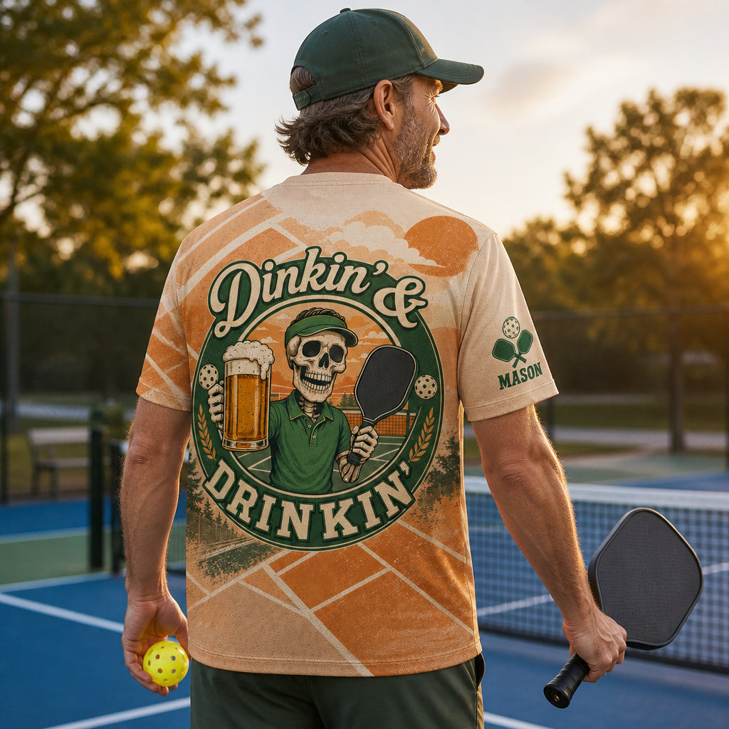Dinkin' & Drinkin' Pickleball Skeleton AOP Tee — Custom Name Sleeve - Personalized T-Shirt - All over printed d91550f7-2d84-4bcc-a944-2a7ecdf7e81c.jpg