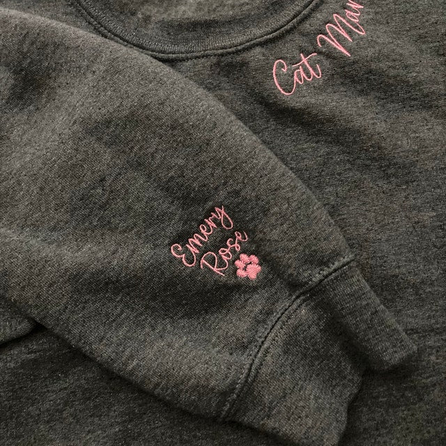 Cat Mom Embroidered Sweatshirt, Custom Mama Shirt With Pet Names, Cat Mom On Neckline, Paw On Sleeve, Gift For Cat Mom, Mother's Day Gift iap_640x640.5816425289_spfkqje7.jpg?v=1743397328