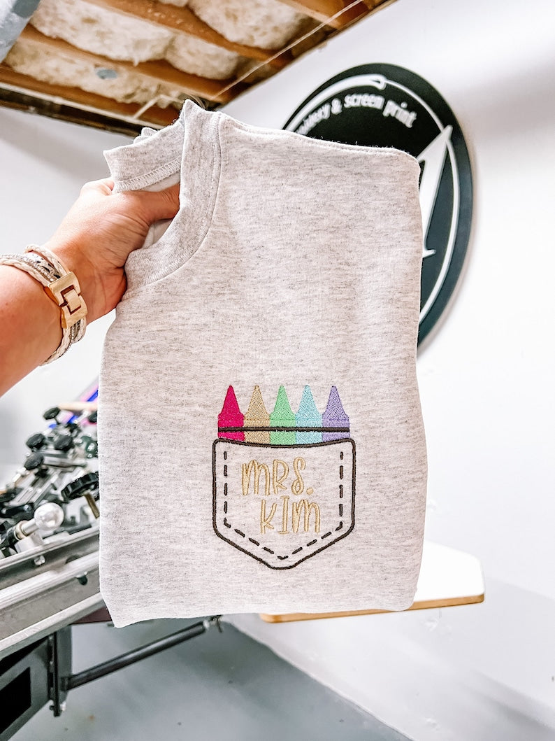 Crayon Pocket Teacher Crew Embroidered Sweatshirt, Gift For Teacher il_794xN.4838961232_q12e_85fa052f-9aca-4af8-86d9-1b5520af0224.jpg?v=1743397378