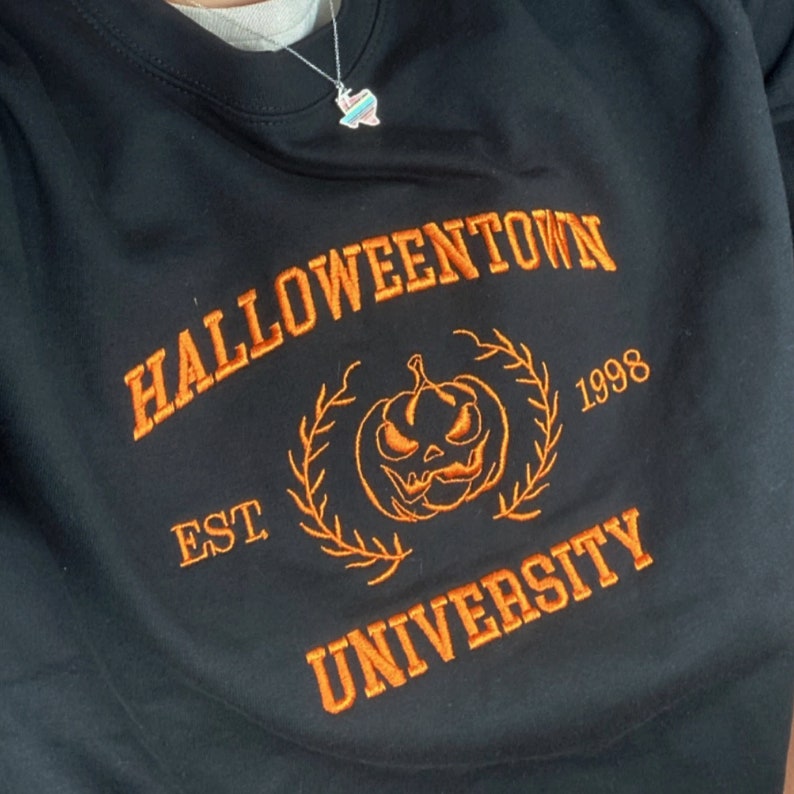 Halloweentown University Embroidered Sweatshirt, Halloween Sweatshirt, Halloweentown University, Pumpkin Shirt, Halloween Shirt For Beloved il_794xN.6119673558_l5k6.jpg