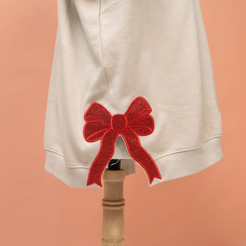 Glitter Gigi Est Claus Embroidered Mimi, Grandma Christmas Bow Embellished Sweatshirt Custom Side Bow Cut-Out Sweatshirt, Christmas Gigi il_794xN.6377076850_4hry.jpg