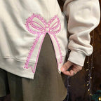 Custom Nana Est Embroidered Christmas Bow Embellished Shirt, Colorful Custom Side Bow Cut-Out Sweatshirt, Christmas Gift Hoodie il_794xN.6377359852_e0o1.jpg