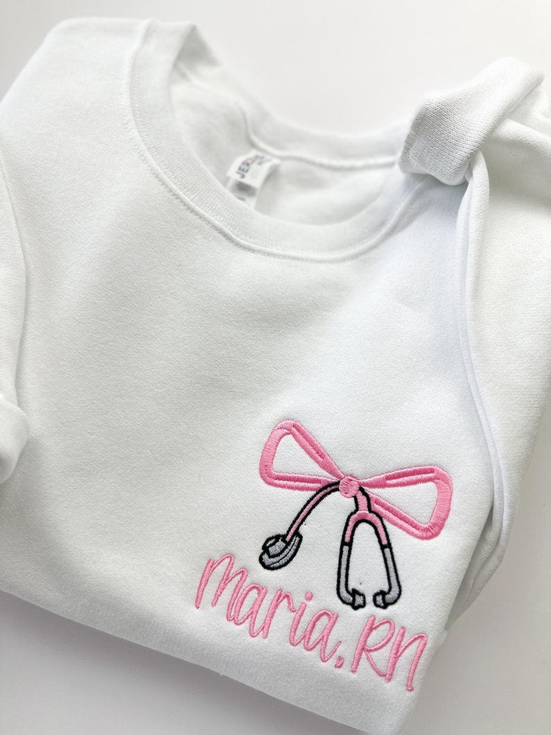 Embroidered Nurse Bow Sweatshirt - Personalized RN Sweatshirt - Custom Crewneck Sweatshirt - Coquette Bow - Nurse Gift il_794xN.6574513776_1wtr.jpg