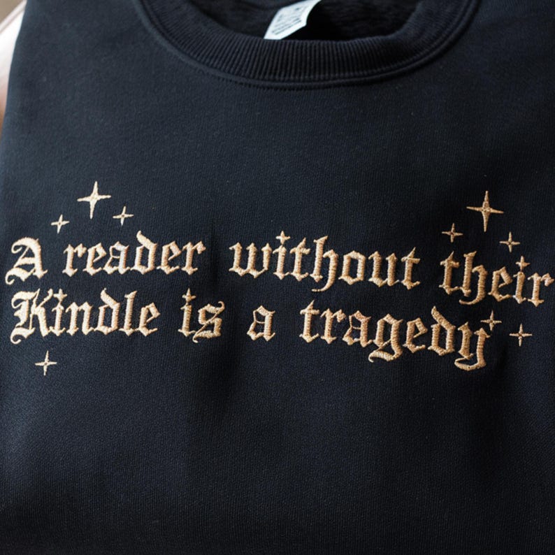 Embroidered Book Lover Sweatshirt A Reader Without Their Kindle Quote Sweater, Reading Gift, Dark Academia Aesthetic Pullover