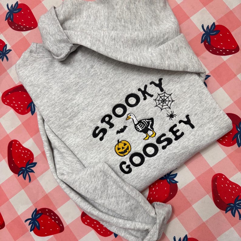 Spooky Goosey Halloween Sweatshirt Funny Goose Skeleton Pullover with Pumpkin, Spider Web & Bat Design Cozy Fall or Spooky Season Gift Sweater