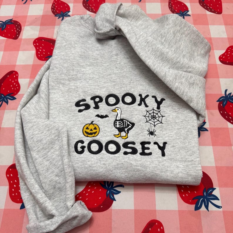 Spooky Goosey Halloween Sweatshirt Funny Goose Skeleton Pullover with Pumpkin, Spider Web & Bat Design Cozy Fall or Spooky Season Gift Sweater
