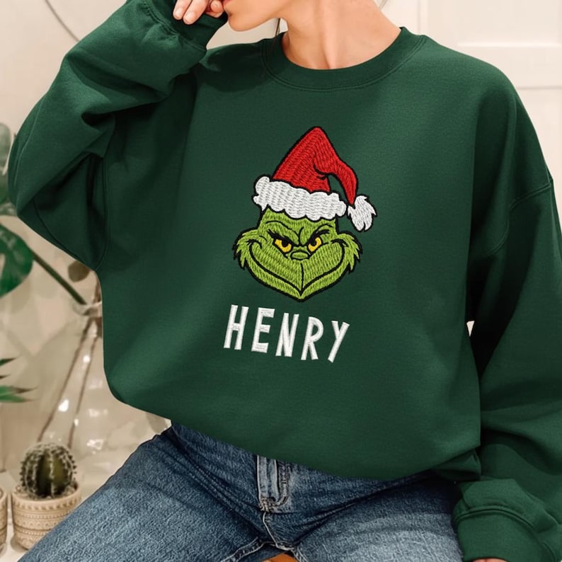 Personalized Grinch Sweatshirt - Custom Name Christmas Crewneck with Santa Hat Grinch Design, Funny Holiday Hoodie for Men and Women